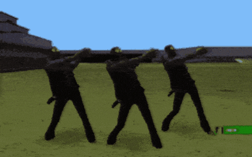 a group of people are dancing in a field with a green item in the foreground that says ' coca cola '