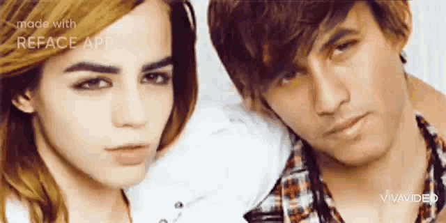 a man and a woman are standing next to each other and their faces are made with reface app .