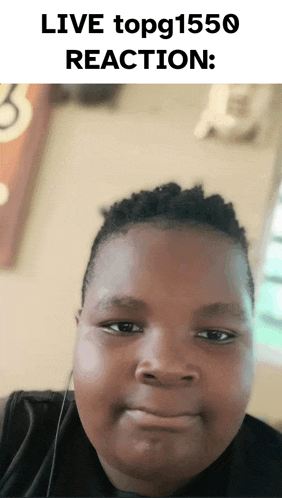 a picture of a boy with the words live topg1550 reaction