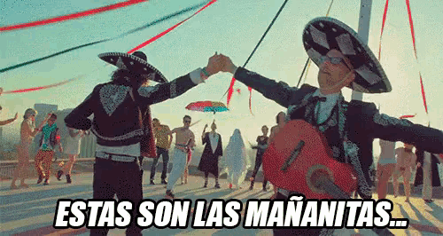 a man in a mariachi outfit is dancing with another man holding an umbrella ..