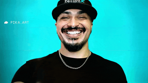 a man with a beard wearing a hat that says pikazoro on it
