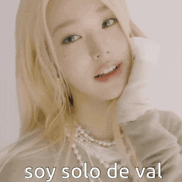 a close up of a woman 's face with the words soy solo de val below it
