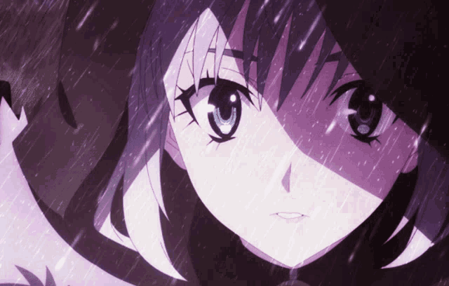 a close up of a girl 's face with purple eyes