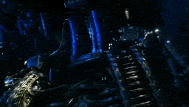 a group of soldiers are standing in a dark room with a blue background