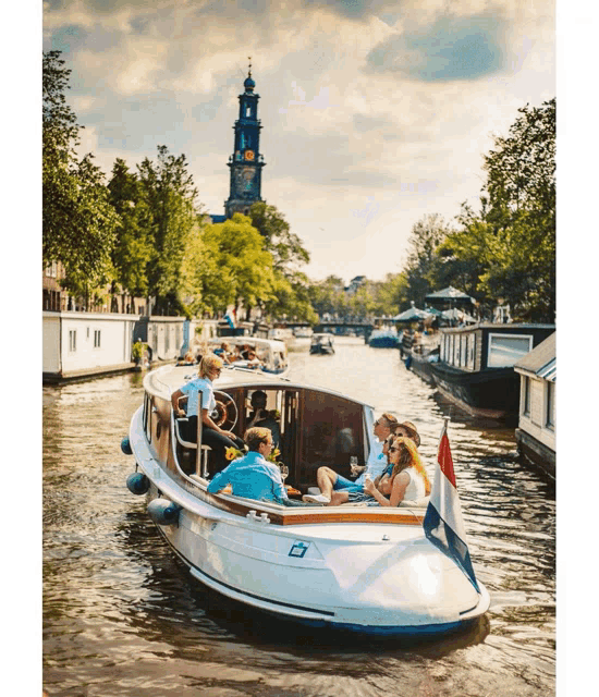 a group of people are on a boat on a river