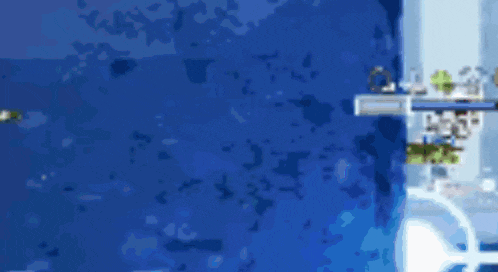 a blurred image of a blue door with a key in it .