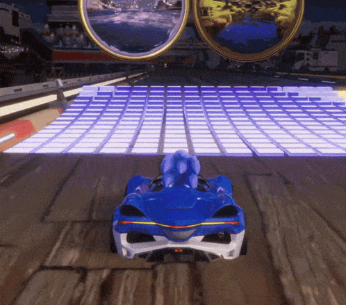 a sonic the hedgehog car is driving down a track
