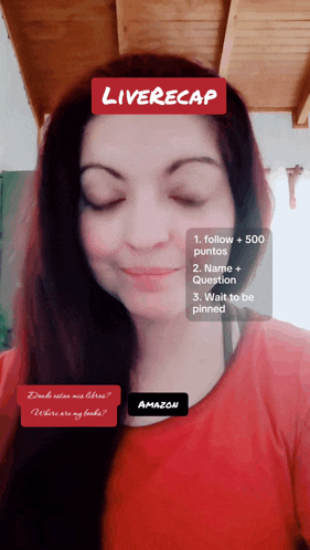 a woman in a red shirt with a liverecap sticker on her face