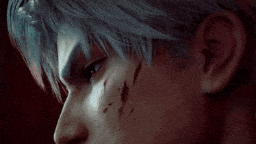 a close up of a person with blood on their face