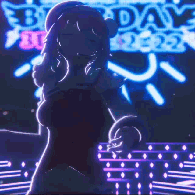 a girl in a red dress is dancing in front of a sign that says birthday