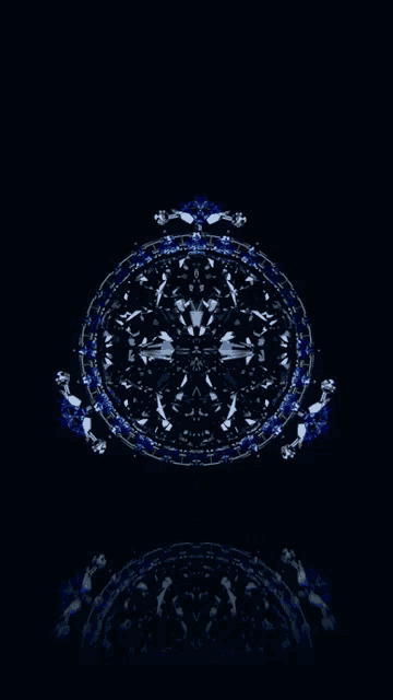 a black background with a blue and white circular design on it