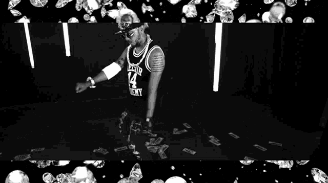 a black and white photo of a man wearing a shirt that says " i 'm next "