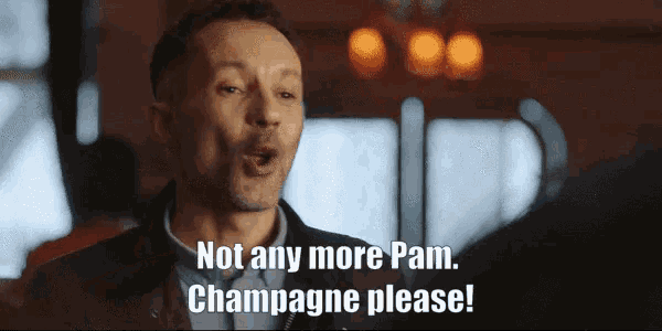 a man says " not any more pam champagne please " in a dark room