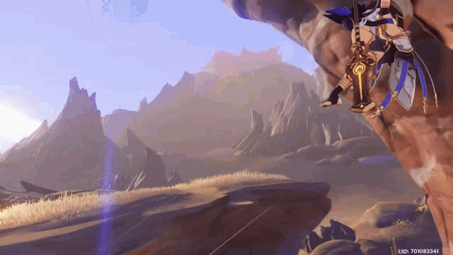 a screenshot of a video game shows a person standing on a rock holding a sword