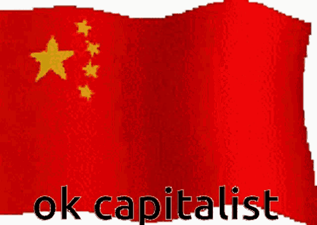 a red flag with yellow stars and the words ok capitalist
