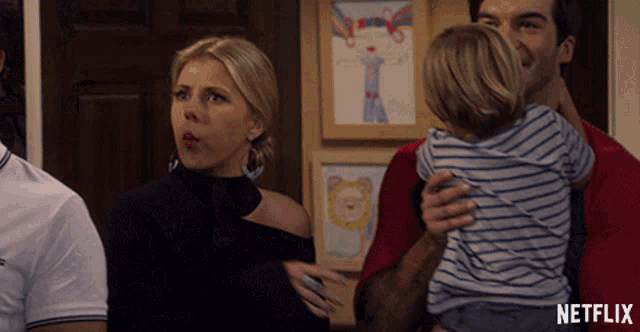 a netflix ad shows a man holding a child in his arms