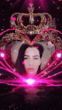 a picture of a woman in a heart shaped frame with a crown