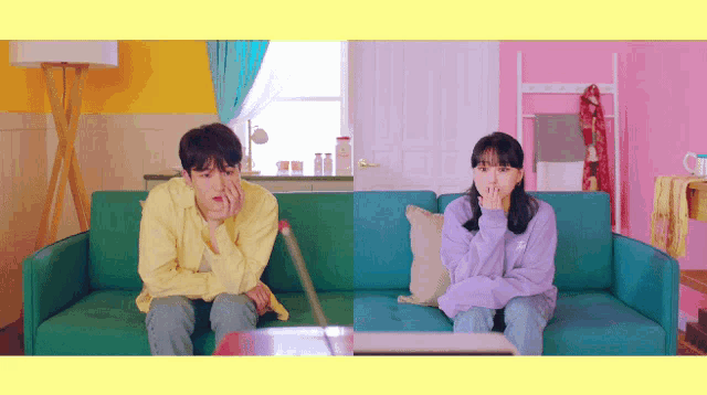 a man in a yellow shirt sits next to a woman in a purple shirt