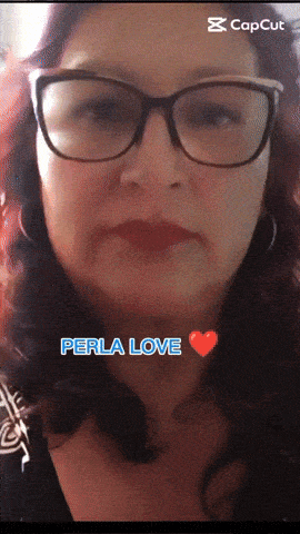 a woman wearing glasses says " perla love " in blue letters