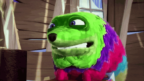 a colorful cartoon character with a green face and purple eyes