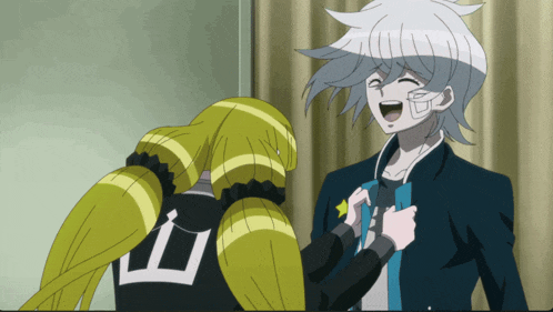 a girl with a number 10 on her back is standing next to a boy
