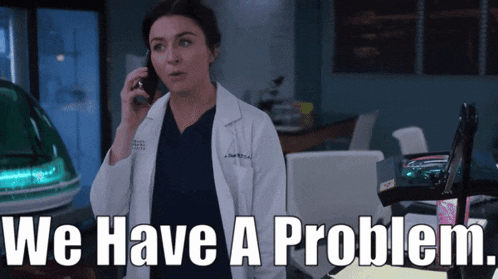 a woman in a lab coat talking on a cell phone with the words " we have a problem " written below her
