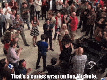 a crowd of people dancing with the caption that 's a series wrap on lea michele ..
