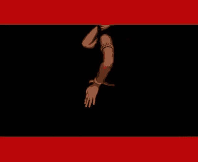 a woman in a black crop top is dancing on a black background .
