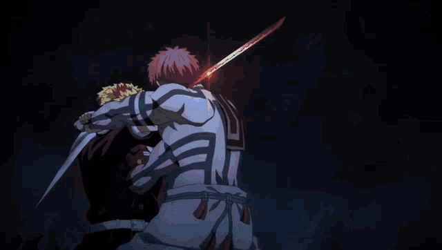 a man in a white cape with red flames on it is hugging another man in a dark room