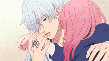 a drawing of a girl with pink hair hugging a boy with white hair