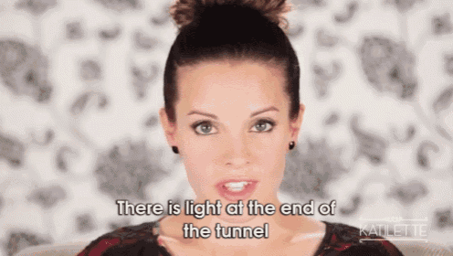 a woman says " there is light at the end of the tunnel " in a video