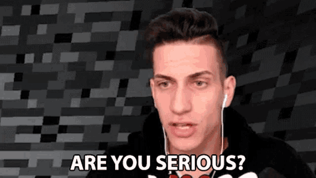 a young man wearing ear buds is asking are you serious