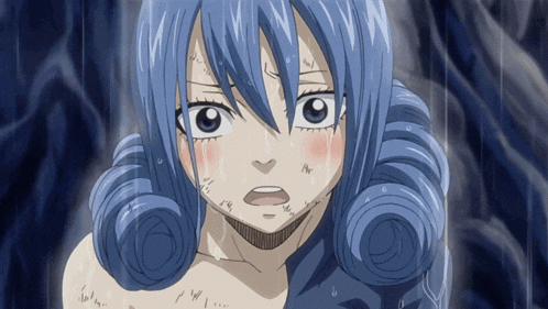 a close up of a girl with blue hair