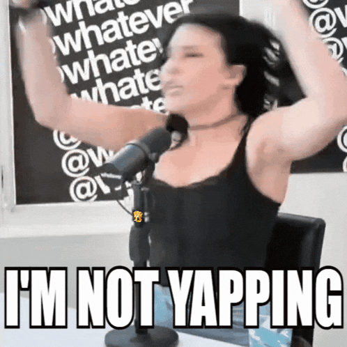 a woman stands in front of a microphone with the words i 'm not yapping above her