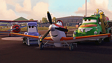 a group of cartoon airplanes are parked next to each other on a runway