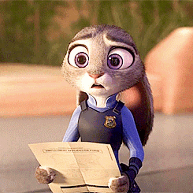 a cartoon rabbit is holding a piece of paper that says zootopia on it