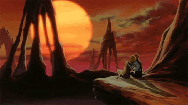 a couple sitting on a rock watching a sunset