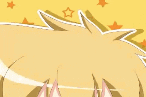 a close up of a cartoon character with blonde hair and blue eyes making a funny face .