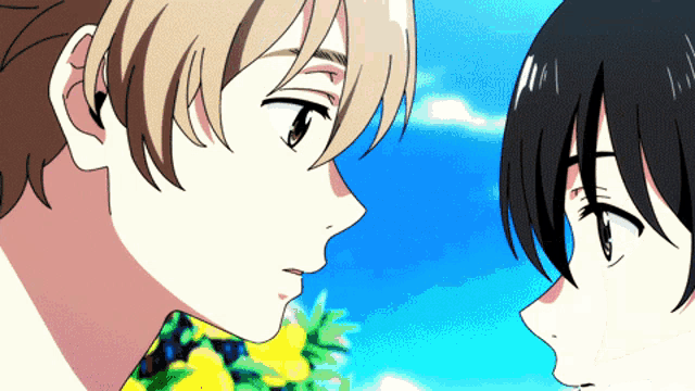a man and a woman are looking at each other with a blue sky in the background