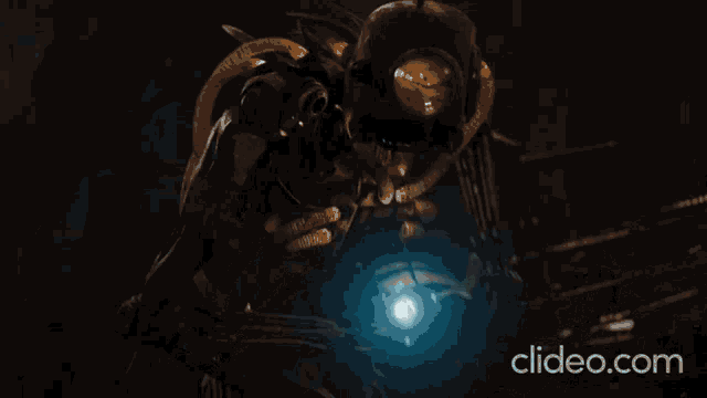 a person is holding a lightning bolt in their hand and the website clideo.com is on the bottom of the screen