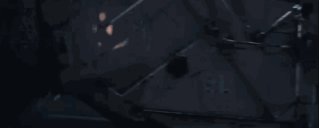 a white sports car is driving down a highway with flames coming out of the exhaust pipes