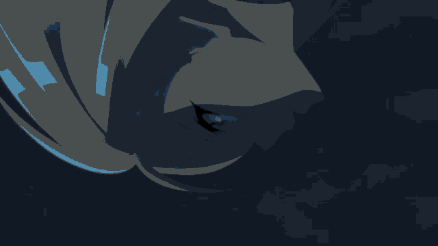 a blue flame is glowing in the dark in a dark room .