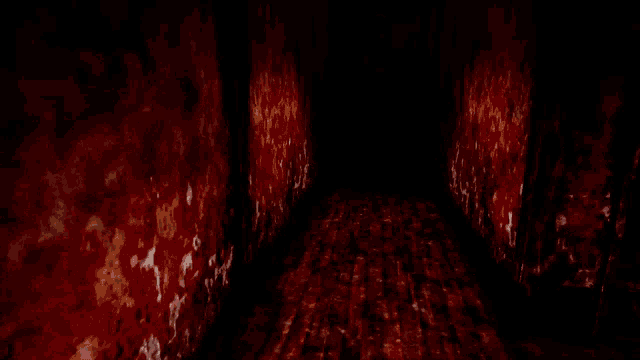 a dark hallway with red walls and a brick floor