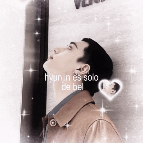 a picture of a man with the words hyunjin es solo de bel written on it