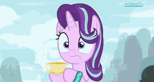 starlight glimmer from my little pony is holding a cup of tea .