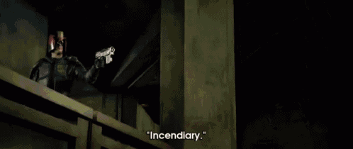 a close up of a person 's face with blood coming out of it and the words " incendiary " written below it .