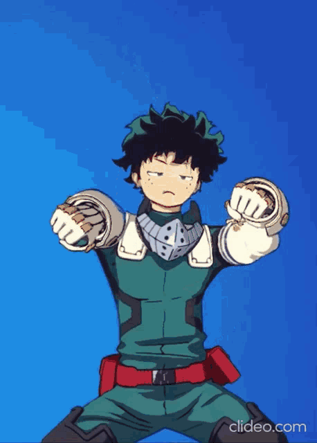 a cartoon of a boy with green hair and a red belt with the words clideo.com below him