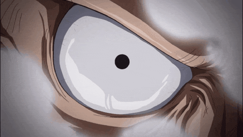 a close up of a person 's eye with a black circle in it