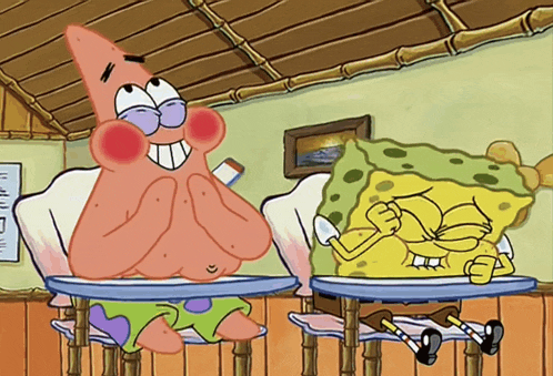 patrick and spongebob are sitting at desks in a classroom
