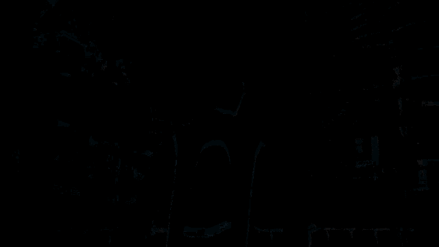 a man in a white shirt stands in front of a neon sign that says express